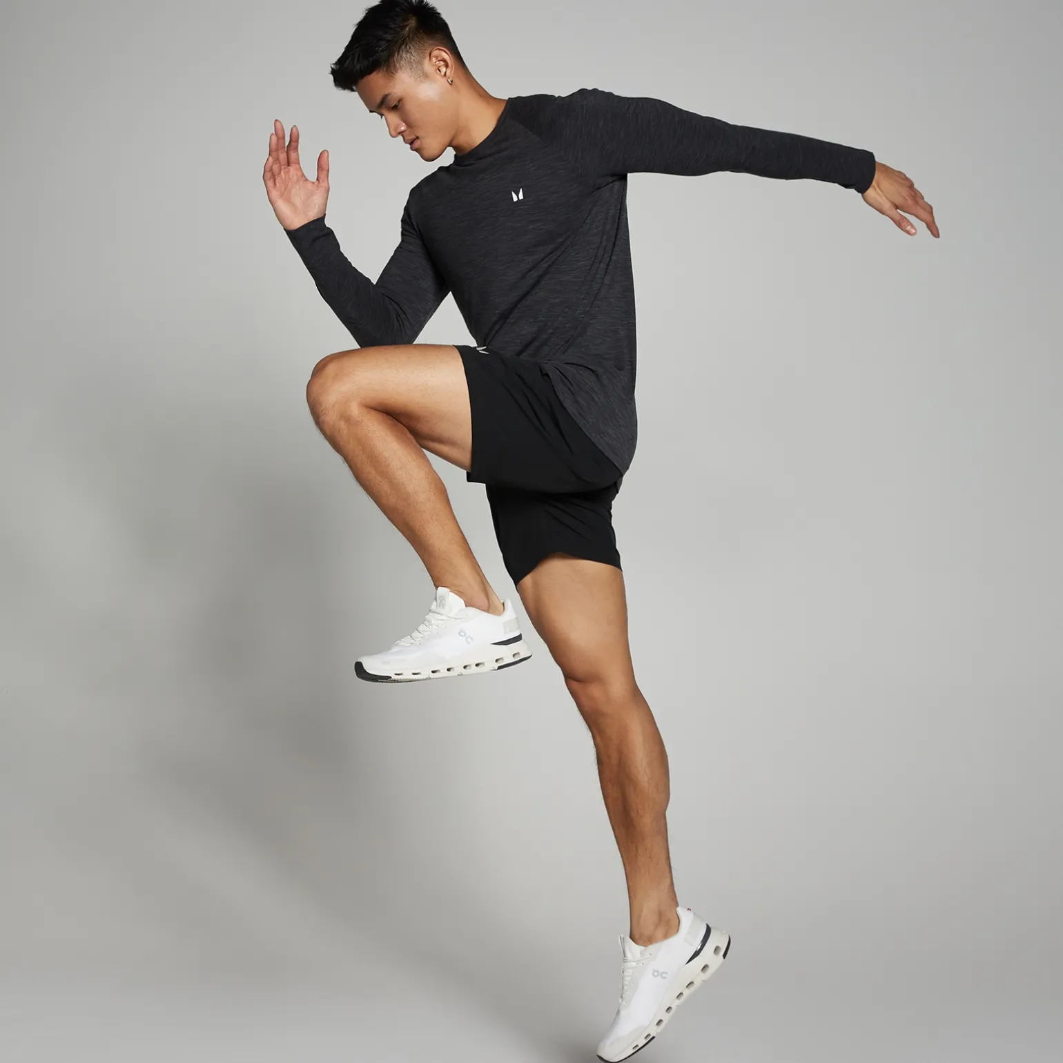 Homme MYPROTEIN Haut à manches longues MP Performance pour hommes – Noir chiné